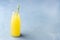 Lemonade on a Blue Background Summer Traditional Italian Homemade Drink Drink of Yellow Color Picture of a Drink in a Bottle