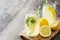 Lemonade drink in a jar glass on wood