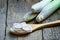 Lemongrass slice in wooden spoon on wooden table