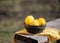 Lemons in a bowl in the open air