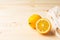 Lemons in cotton shopping eco friendly bag on wooden background with copyspace. Help for colds, natural remedies for the disease