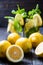 Lemons on a dark wooden table, lemonade background. selective focus