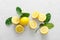 Lemons. Fresh juicy lemons with leaves on white background