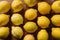 Lemons on kitchen table, vibrant citrus fruits arranged beautifully