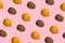 Lemons and kiwis multiplied on trendy soft pink background