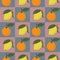 Lemons and oranges in squares seamless pattern