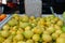 Lemons sold in outdoor market. Ripe spanish citrus fruits