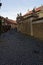 Lenghty view of the stone street near the wall with climbers