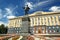 Lenin monument and city administration building in sunny day in