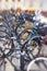 A lens blurred photo of lots of parked bikes. Symbolic content.