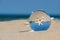Lensball summer vacation landscape with starfish reflection. Travel and leisure concept.