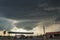 Lenticular shaped wallcloud of a supercell thunderstorm over a Texas town