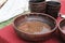 Lentils and beans soaked in water in a wooden dish for cooking