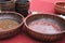 Lentils and beans soaked in water in a wooden dish for cooking