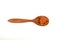 Lentils with spices in wooden spoon on white background, close-up. Ingredients for Indian Masurdal soup. Dry legumes. Long-term