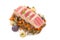 Lentils with vegetables on top of tuna pieces on isolated background