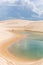 LenÃ§Ã³is Maranhenses, known for its vast desert landscape of tall, white sand dunes and seasonal rainwater lagoons.