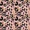 Leopard coat seamless pattern. Animal skin repeat print with brown and black spots on warm pink background.