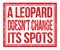 A LEOPARD DOESN`T CHANGE ITS SPOTS, text on red grungy stamp sign