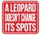 A LEOPARD DOESN`T CHANGE ITS SPOTS, words on red stamp sign