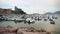 Lerici Harbor with Inflatable Boats and Sailing Boats. Lerici Castle in the background