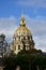 Les Invalides golden dome from nearby street. Paris, France.