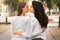 Lesbian Couple Of Girls Kissing Having Date Outdoor, Back-View