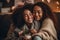 lesbian couple giving gifts and presents to each other, female gay lgbt homosexual african american marriage or black girlfriends