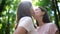 Lesbian couple kissing passionately, same sex marriage happiness, lgbt rights