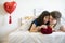 Lesbian couple lifestyle romantic together on bed