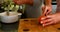 Lesbian couple preparing food in kitchen at home 4k