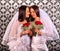 Lesbian couples in wedding bridal dress kissing .