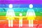 Lesbian family with child white sign on a rainbow gay flag wood planks background