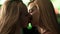 lesbian females kissing passionately in nightclub, drunk girls making out