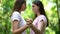 Lesbians holding hands, feel attraction to each other, trustful same-sex love