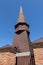 Lesno, Pomeranian Voivodeship / Poland - June 14, 2019: Old historic wooden church in a small village. Christian temple built of