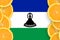 Lesotho flag in citrus fruit slices vertical frame