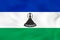 Lesotho waving flag. Lesotho national flag background texture