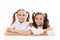 Lesson where learning begins. Cute school children sitting at school desk. Little schoolgirls having lesson at primary