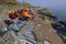 LESVOS, GREECE OCTOBER 24, 2015: Lifejackets, rubber rings an pieces of the rubber dinghys discarded on a beach near Molyvos.