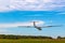 A LET L-23 glider aircraft airborne about to land.