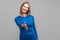 Let me introduce myself. Portrait of friendly woman giving hand to handshake, greeting guests with toothy smile. indoor studio