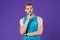 Let me think. Man with strong muscular arms. Man muscular handsome unshaven thoughtful guy on violet background