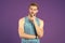 Let me think. Man with strong muscular arms. Man muscular handsome unshaven thoughtful guy on violet background