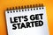 Let`s Get Started text on notepad, concept background