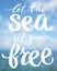 Let the sea set you free, hand written lettering on blur background