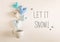 Let It Snow message with blue heart cushions