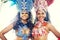 Let them entertain you. beautiful samba dancers performing at a carnival.