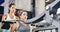 Lets begin.... Cropped shot of a female fitness instructor taking her client through a workout in the gym.