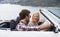 Lets get driving. Shot of a young couple enjoying a drive along the coast in a convertible.